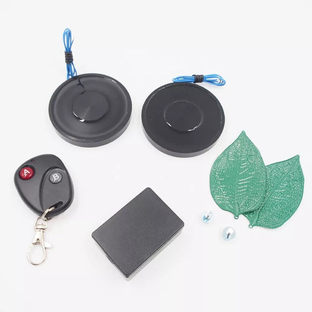 Magnetinis laikiklis su valdymo pulteliu